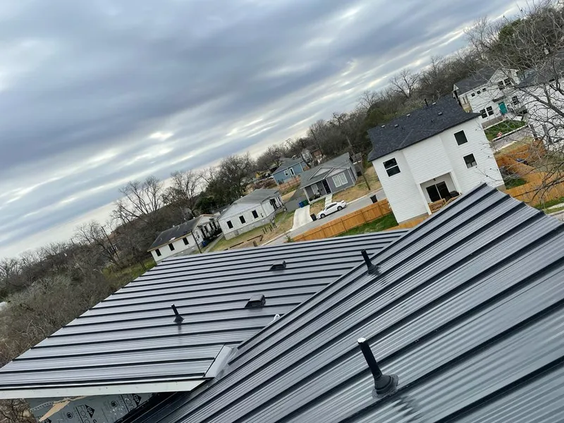 Standing seam metal roof panels with vents for Skylight Repair in Amherst
